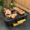 Brasero de mesa premium con chorizos, morcillas y carne asada